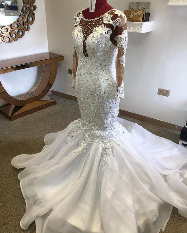 Inspired by this mermaid wedding dress at ballbella.com, we meet all your needs with this Classic Beading Mermaid Sheer Tulle Wedding Dress.