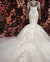 Check this Luxurious Crystals Mermaid Bridal Gownsat Ballbella.com. 1000+ Styles to choose from, fast delivery worldwide, shop now.