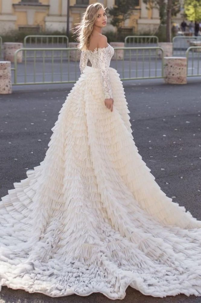 Inspired by this wedding dress at ballbella.com,A-line style, and Amazing work? We meet all your need with this Classic Off the Shoulder Wedding Gown Long Sleeves Floral Mermaid with Detachable Train.