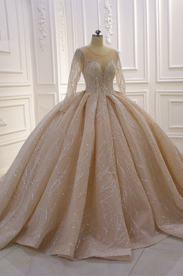 Wanna get a dress in Tulle, Ball Gown style, and delicate Beading,Appliques,Ruffless work? We meet all your need with this Classic Shiny Ball Gown Tulle Jewel Long Sleevess Ruffless Wedding Dress at factory price.